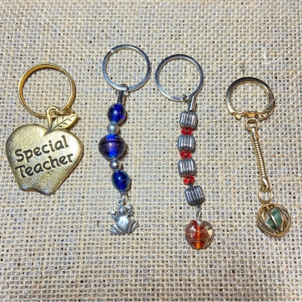 Lot of key chains rings with faux pearls bag airplane teacher in mixed tones